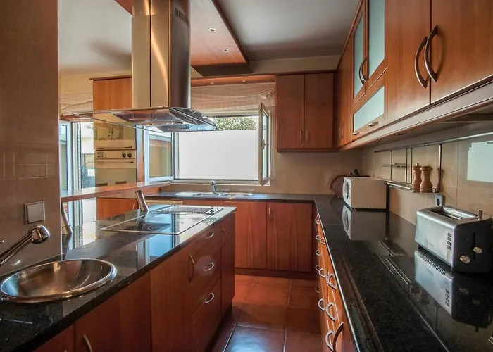 In Prázdninový dům *